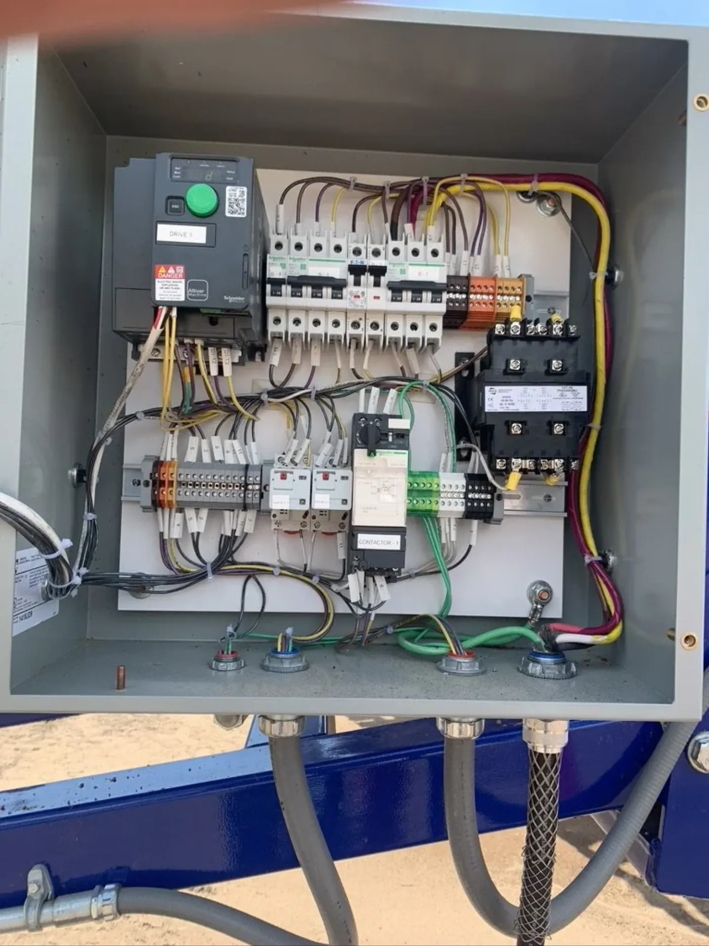 Conveyor drive control panel with a variable frequency drive and wiring